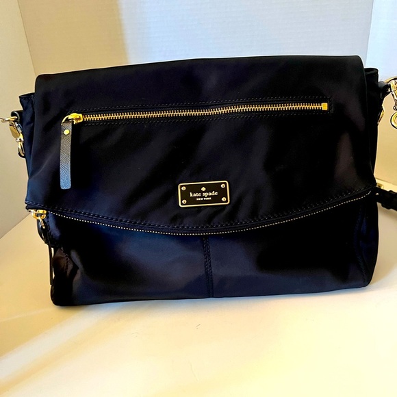 kate spade Handbags - Kate Spade Black and Gold Crossbody Bag with Flap Design